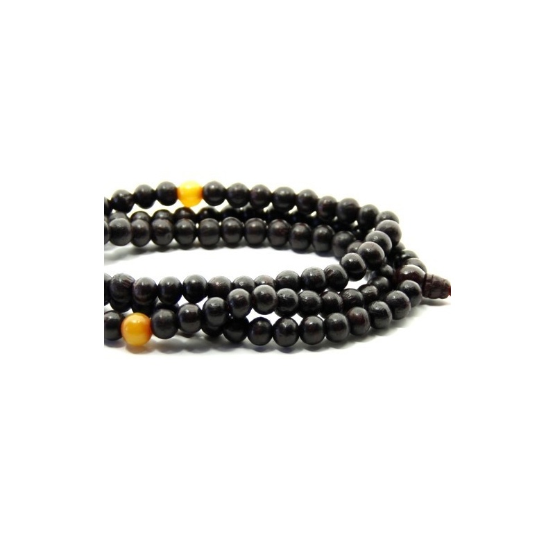 Mala en bois et ambre